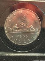 Reverse side showing Voyageur canoe design and date 1969