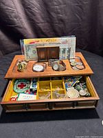 overview of jewelry box open with contents visible