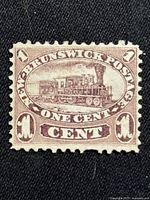 Front view of 1¢ New Brunswick locomotive stamp showing design and centering