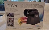 Front of product box showing Artograph Tracer projector image and branding