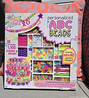 Front of Personalized ABC Beads kit showing contents and branding