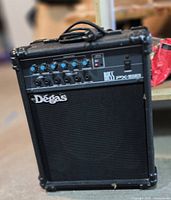 Front view showing El Degas branding, control panel and speaker grille