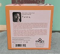 Back of product box detailing artist and design