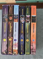 Spines of six Warriors: Power of Three paperbacks in slipcase