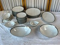 Full set of dinnerware pieces arranged together