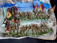 Overview of all metal toy soldiers in tray