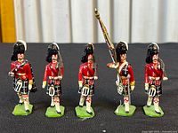 Front view of all five Seaforth Highlanders metal soldiers
