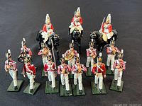 All 15 painted metal British military toy soldiers grouped together