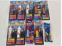 Group shot of nine carded dispensers and one polybag dispenser