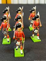 Front and side view of soldiers in formation highlighting paint and bases