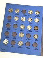 First interior page showing date slots 1916–1925 with coins and vacant holes.