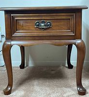 Full view of side table front and legs