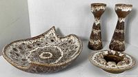 top view of serving bowl, ashtray, two candlesticks