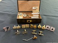 Overview of cufflinks, tie clips and case