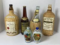 All six vintage bottles front view