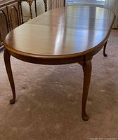 full view of walnut dining table without leaves