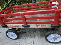 Side view showing Express Wagon text, wood rails, wheels