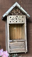 Wood and metal insect house front view