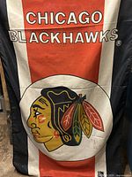 Full view of flag front with team name and logo