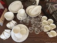 Overview of dinnerware and glassware grouped on table