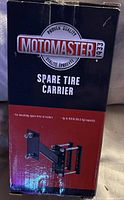 Front of MotoMaster spare tire carrier box showing product name and image