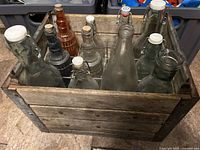 Top view showing 12 bottles in wooden crate dividers