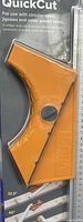 Front of packaged QuickCut saw guide and ruler showing brand and tool