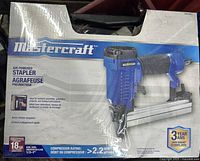 Front of sealed box showing Mastercraft air-powered stapler and specifications