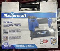 Front of retail box showing Mastercraft air-powered pin nailer and specifications