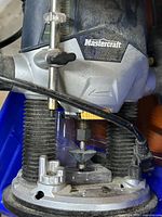 Front view of Mastercraft plunge router showing brand and base
