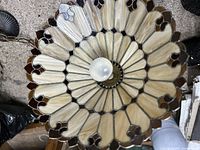 Full view of pendant shade with bulb installed showing glass pattern