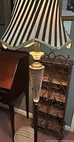 Lamp with cut crystal section, striped shade and base