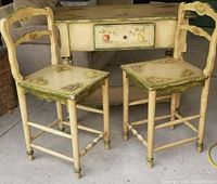 console table and two chairs front view