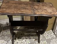 Top view showing distressed wooden top surface with scalloped edges