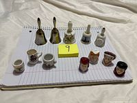 Top view of all 12 items laid out on notebook