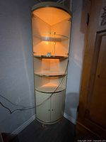 cabinet lit showing overall appearance and lighted glass section
