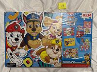 Front of sealed Paw Patrol 8-puzzle pack box showing characters and 8x24 label
