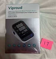 Front of sealed Viproud blood pressure monitor box showing product image and model