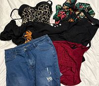 All garments spread on white background