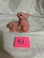 Front view of the two pink ceramic rabbit shakers together