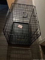 Overall view of folded crate standing upright
