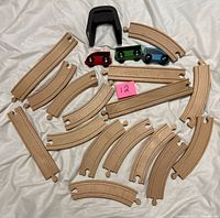 All track pieces, cars and tunnel spread out