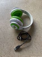 Headphones and USB cable laid out