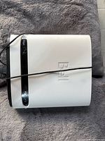 Top view of Bell GigaHub 5689e with attached cable