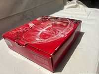 Closed box showing product photo and branding