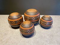 All four pottery spheres front view