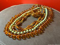 All four jewellery pieces displayed together