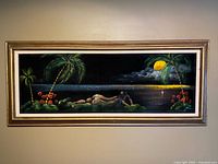 Full view of framed velvet painting on wall