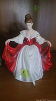 Front view of Royal Doulton Sara figurine showing full gown and pose