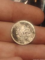 Reverse of 1905 Liberty Head V nickel showing large "V" and wreath